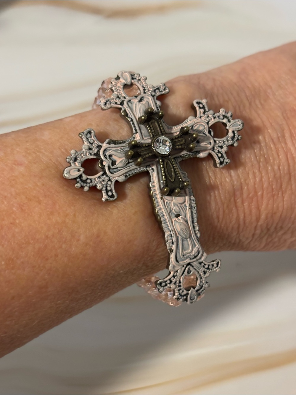 Vintage-Inspired Pink Cross Stretch Bracelet with Rhinestone Accent